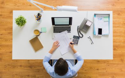 businesswoman with tax report at office